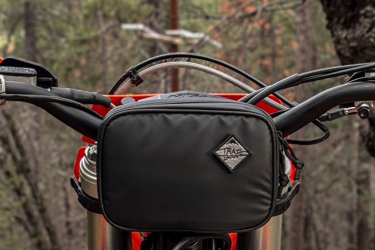 Pad Pack Medium Single Pocket mounted on a dirt bike handlebar