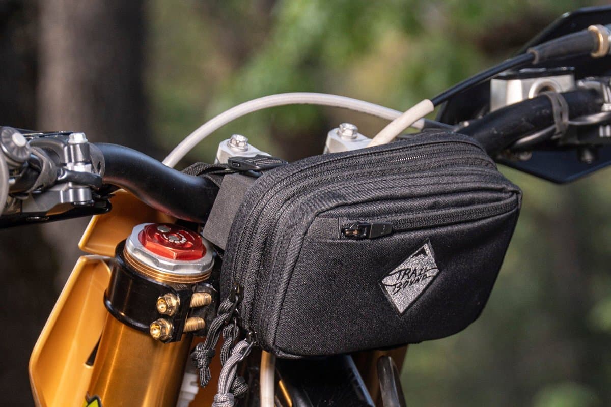 Pad Pack Small Double Decker mounted on a dirt bike handlebar, three-quarter view