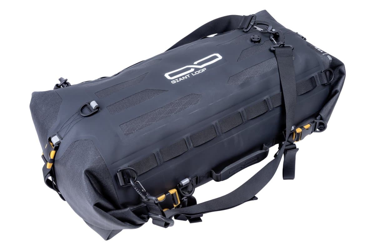 Giant Loop Tillamook dry bag, rolled and buckled, with carry strap