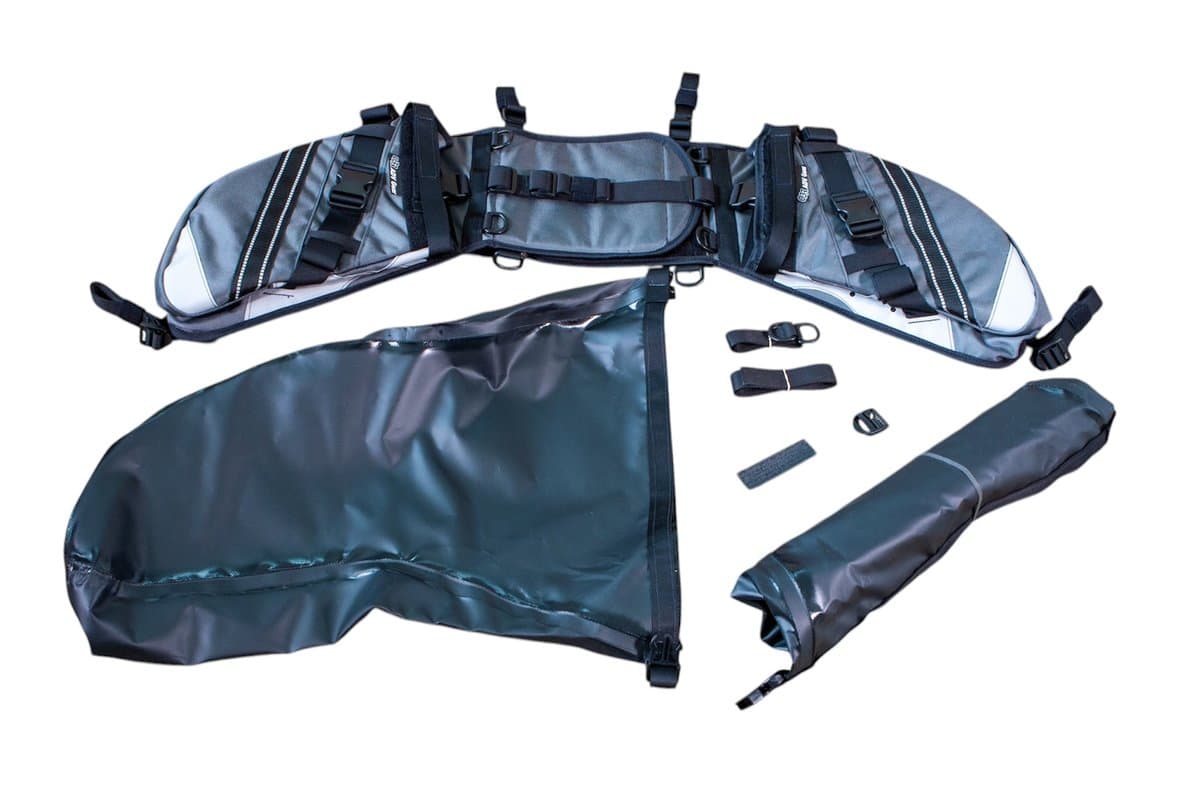 OBR 38L 2.0 holsters with black roll-top dry bags and mounting straps laid out on white