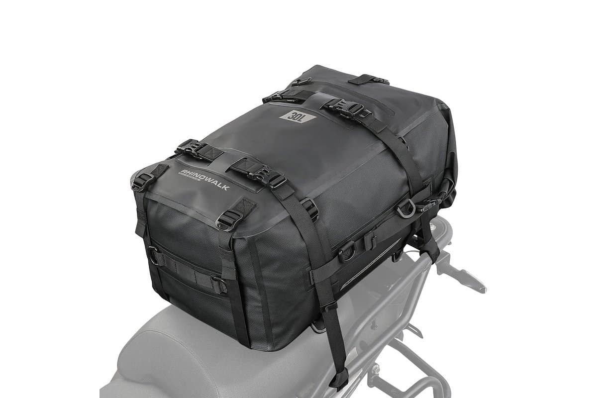 Rhinowalk 30L roll-top modular dry bag, black, strapped to a passenger seat