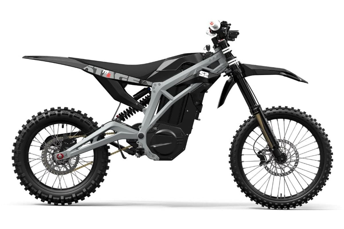 2026 Stage2 M2 electric dirt bike in black with a grey alloy frame, right-side studio profile on a white background