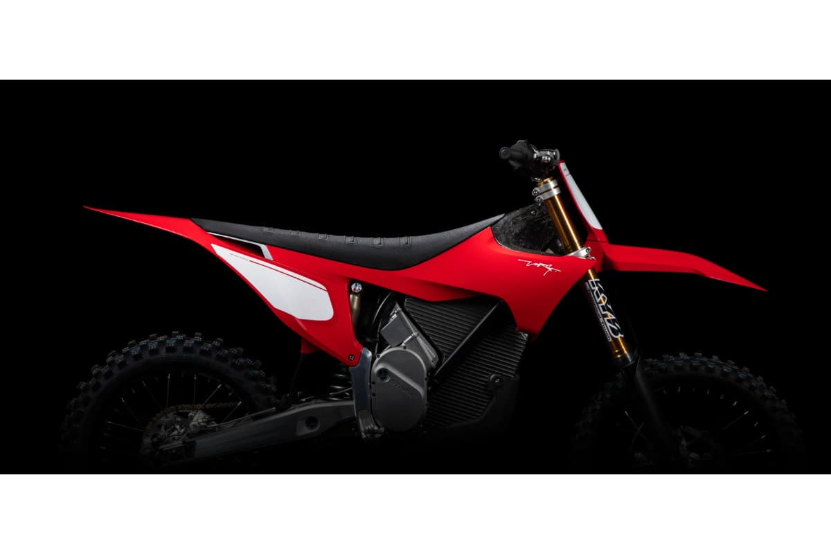 Stark Varg MX Factory Edition in Stark Red, side profile against a black background