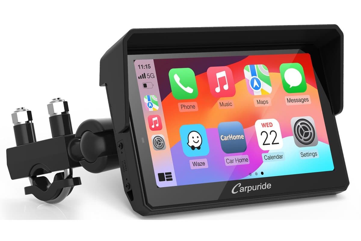 Carpuride W502 Pro 5-inch display with sun visor on its U-bolt handlebar mount, showing the CarPlay home screen