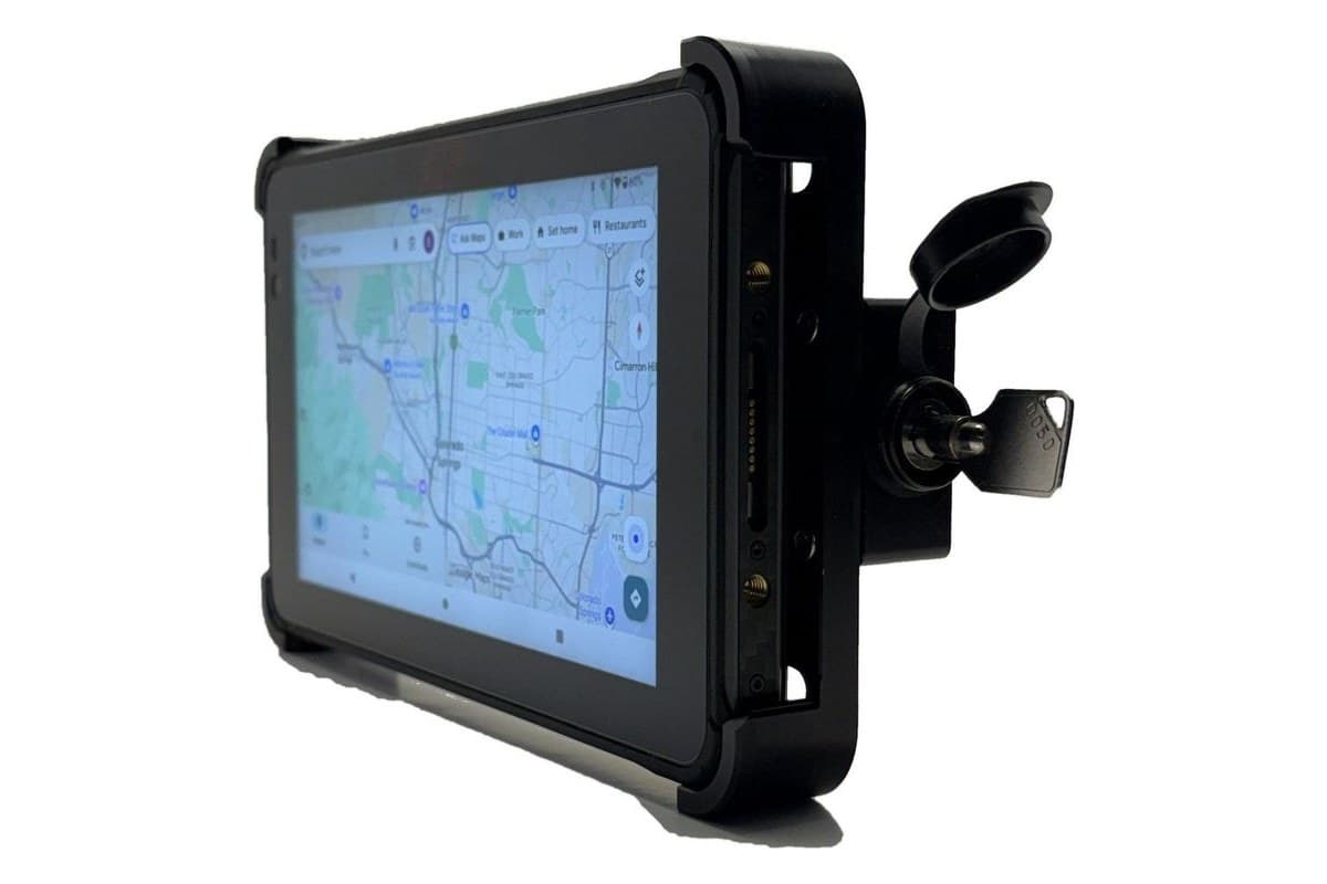 The tablet locked into ATP's aluminium AMPS holder, with the barrel key in the lock