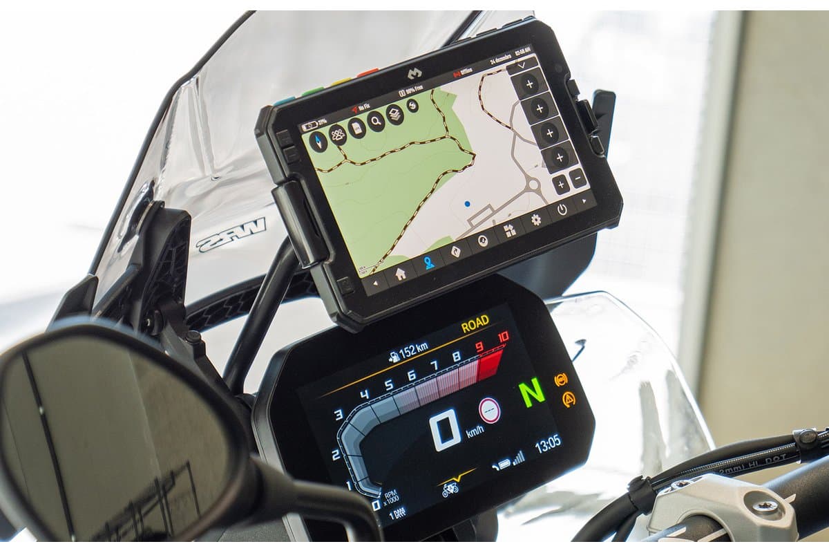 DMD NOR7E mounted above the dash of a BMW GS showing a trail map