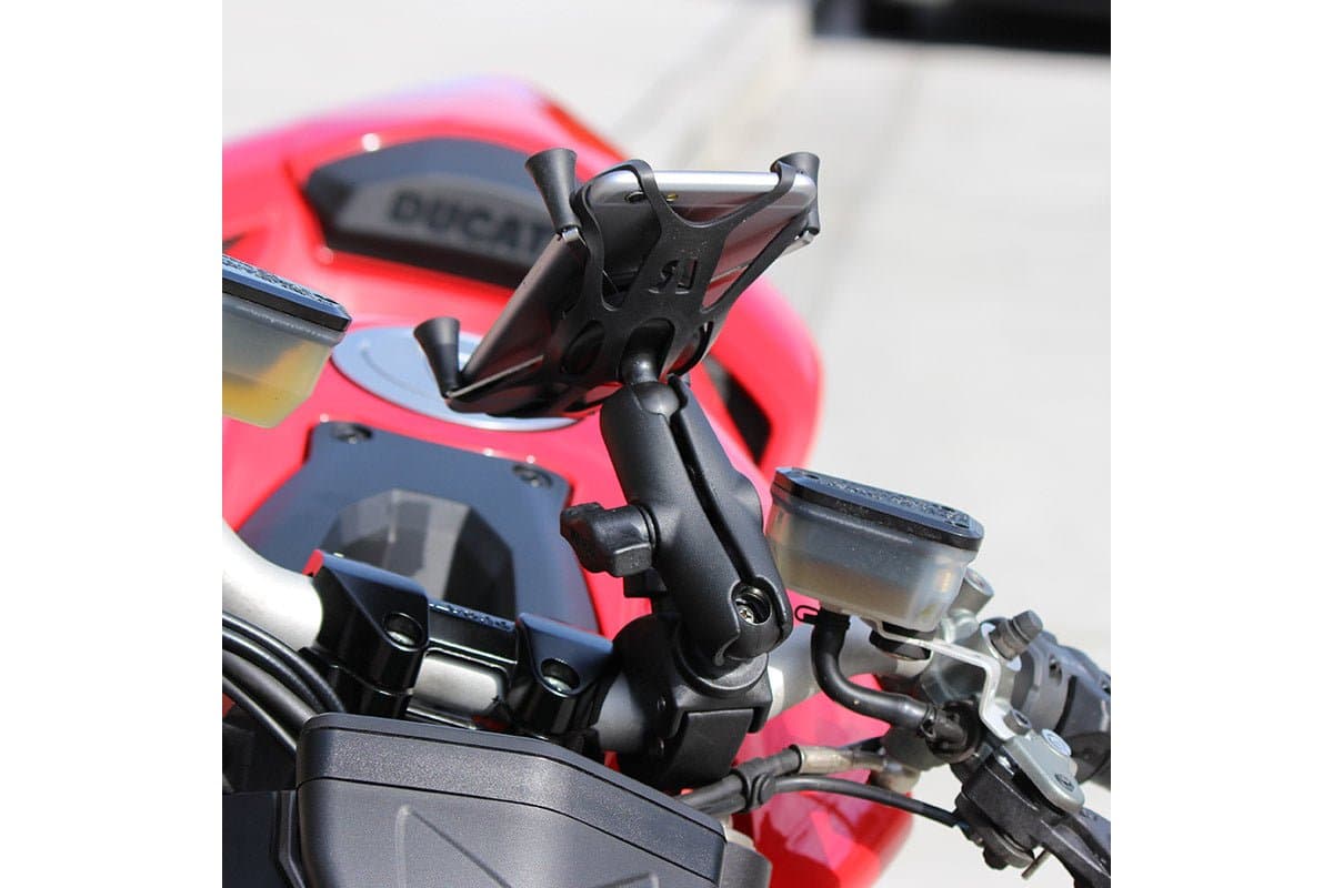RAM X-Grip mount on a red Ducati's handlebar next to the brake reservoir