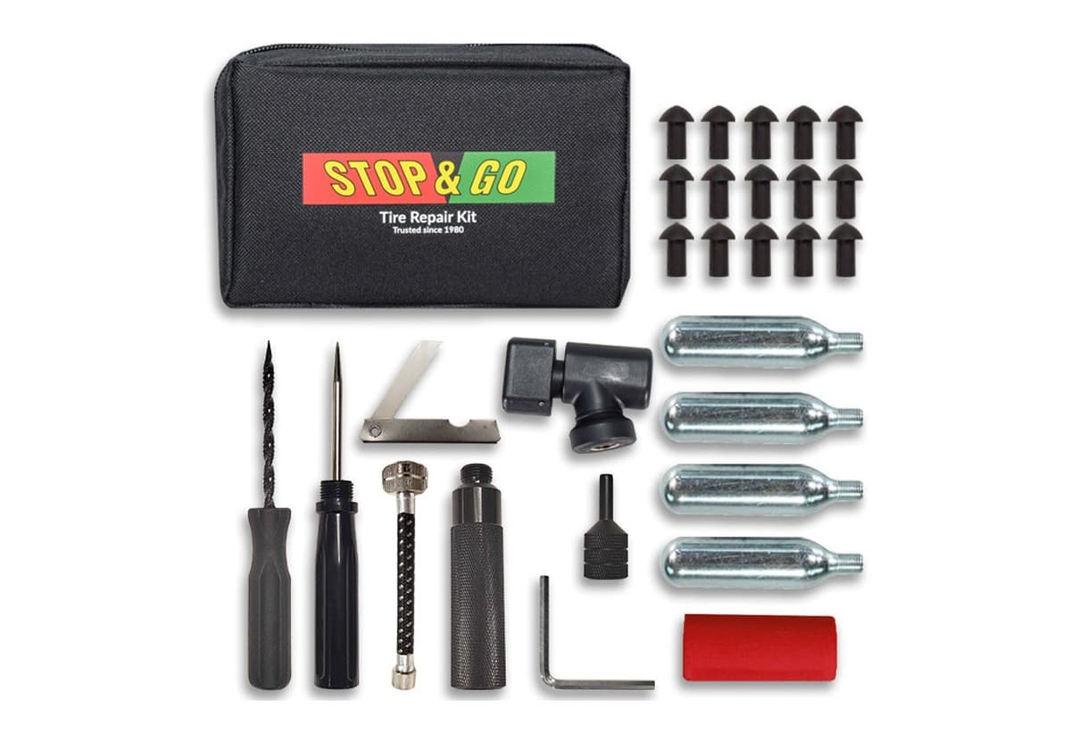 Stop & Go 1001A kit: zippered pouch, 15 mushroom plugs, plugger tools, four CO2 cartridges and inflator head