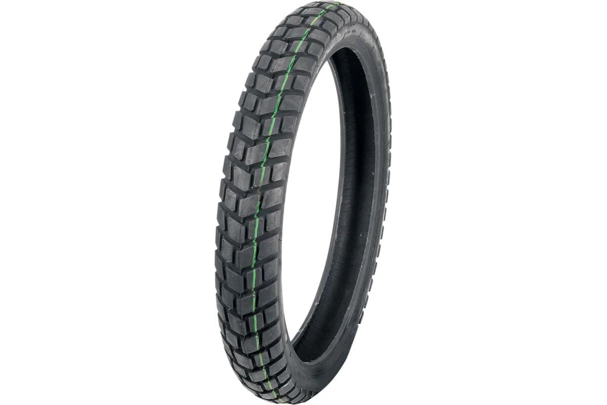 Duro HF903 Median: front tire, upright three-quarter view on white, narrow carcass with a blocky dual sport tread and a green paint line around the crown