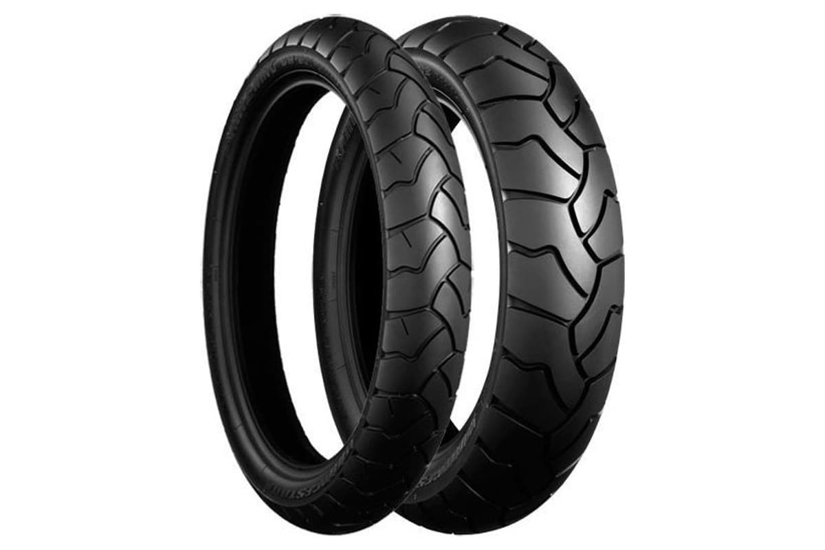 Bridgestone Battle Wing BW501 front and BW502 rear, three-quarter view showing the sidewalls and shoulder tread, on white