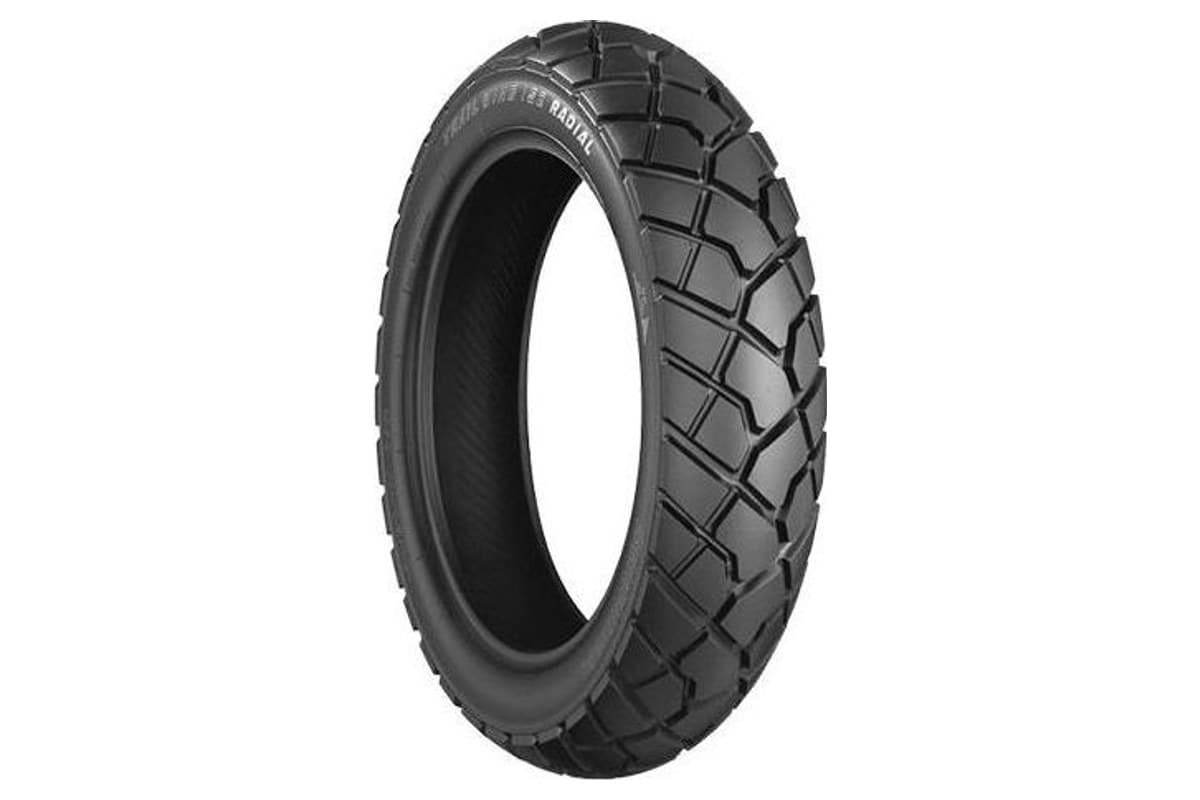 Bridgestone Trail Wing TW152 Radial rear tire, three-quarter view showing the TRAIL WING 152 RADIAL sidewall and block tread, on white
