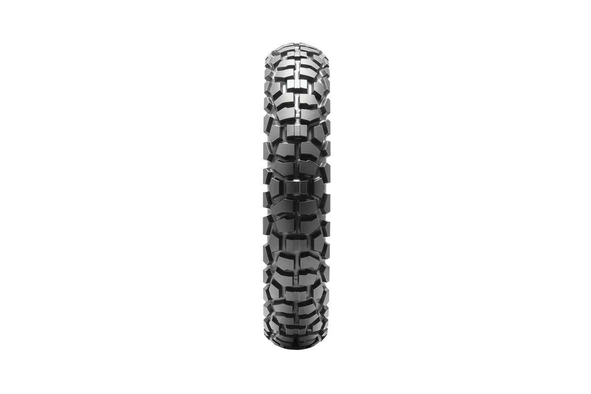 Dunlop D605: rear tire head-on, showing the crown block pattern