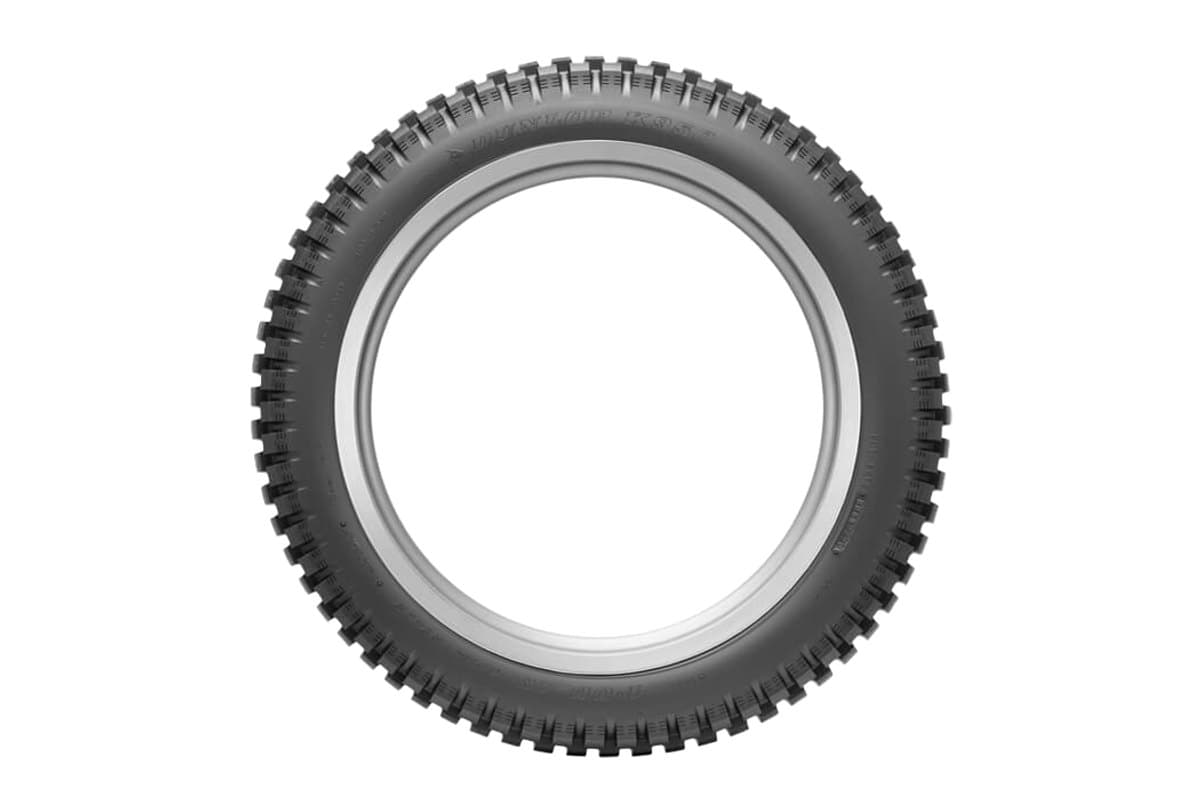 Dunlop K950: the tire face-on as a full ring, whole tread circumference and moulded sidewall lettering visible