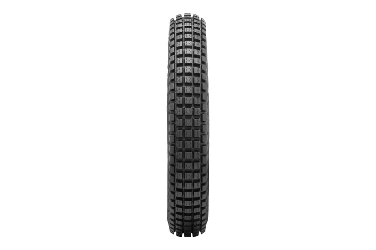 Dunlop K950: head-on view showing the dense square block crown