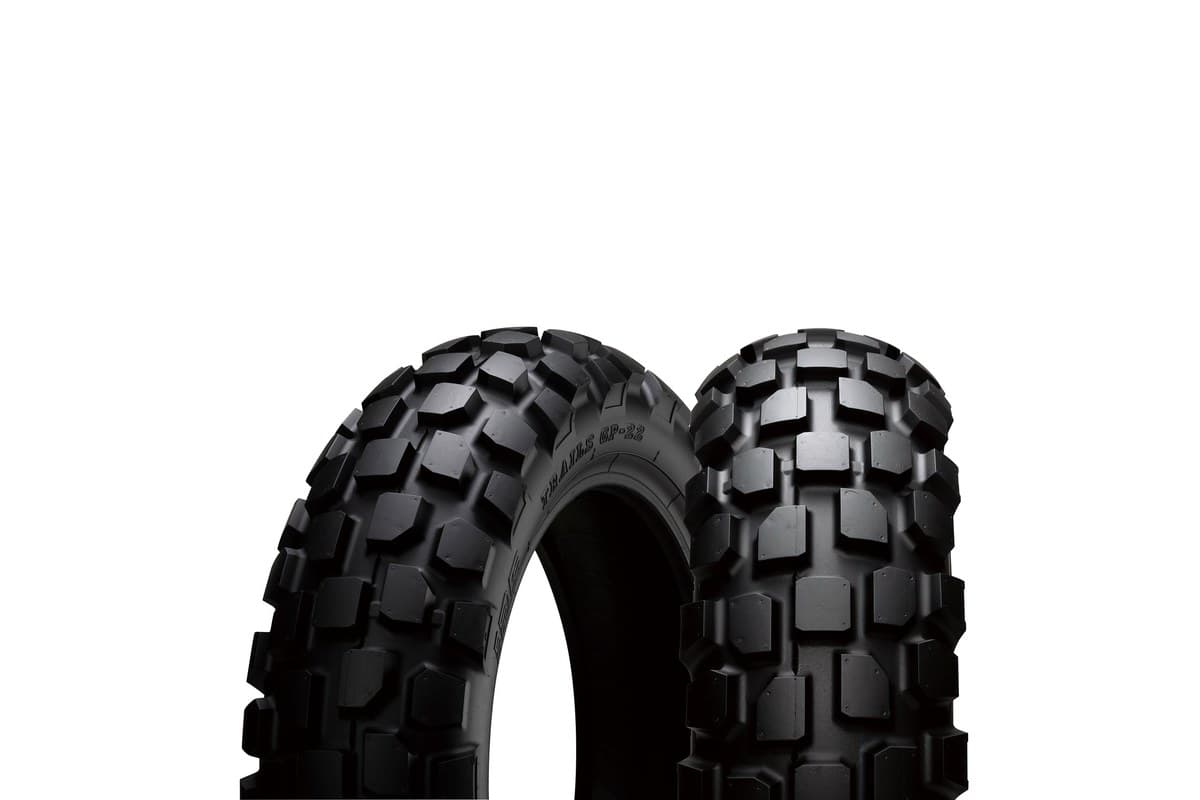 IRC GP-22: the 12 inch mini bike size, two of the same tire in three-quarter view with GP-22 moulded into the sidewall, on white