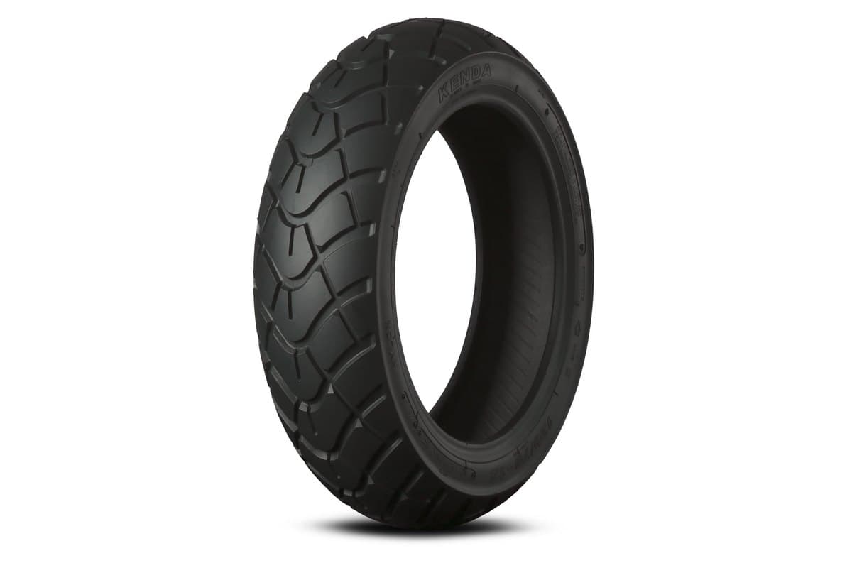 Kenda K761 Dual Sport: the fat 12 inch scooter size, same studio setup, much wider and rounder with the same tread stretched across the crown