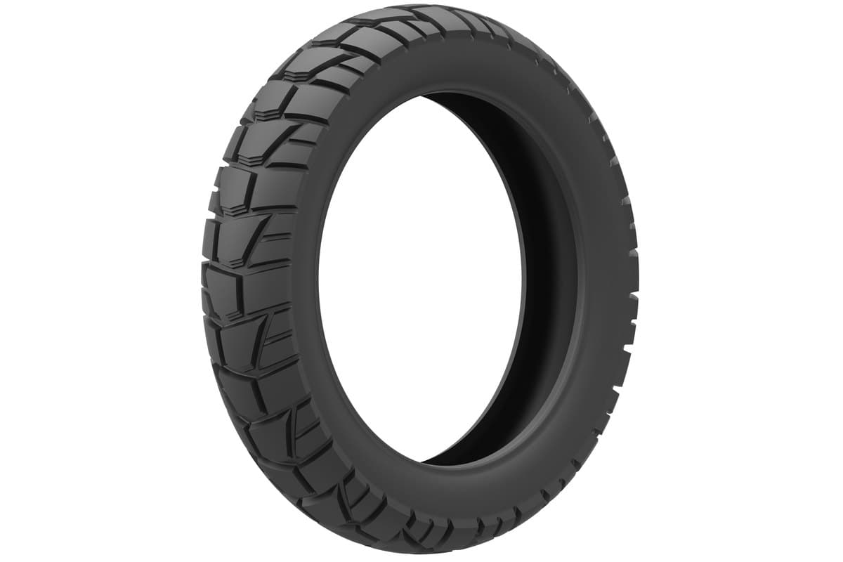 Kenda Trakmaster DTR: rear tire, same angled view, wider and squatter with a broader block layout. Also a CGI render