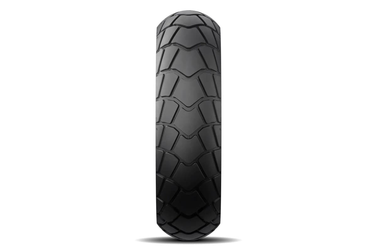 Michelin Anakee Adventure 2: rear tire head-on, the full tread of interlocking arrow-shaped blocks across the carcass