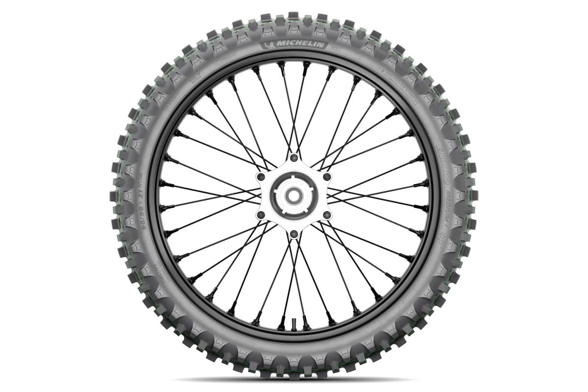 Michelin Enduro Medium 2: flat side-on profile of the front on a black spoked wheel, the knob ring and MICHELIN lettering visible
