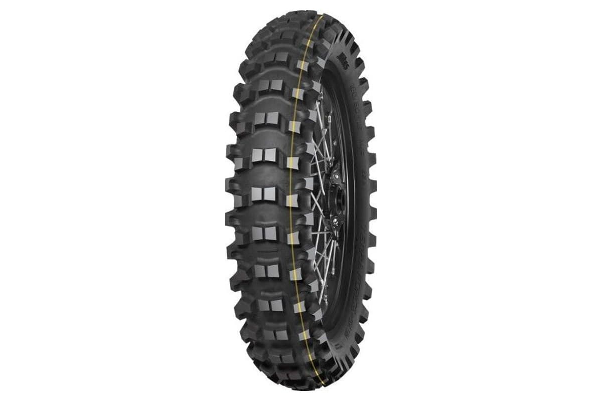 Mitas Terra Force-EX SM Super: the rear tire alone on a spoked wheel, yellow stripe across the tall paired knobs, three-quarter view