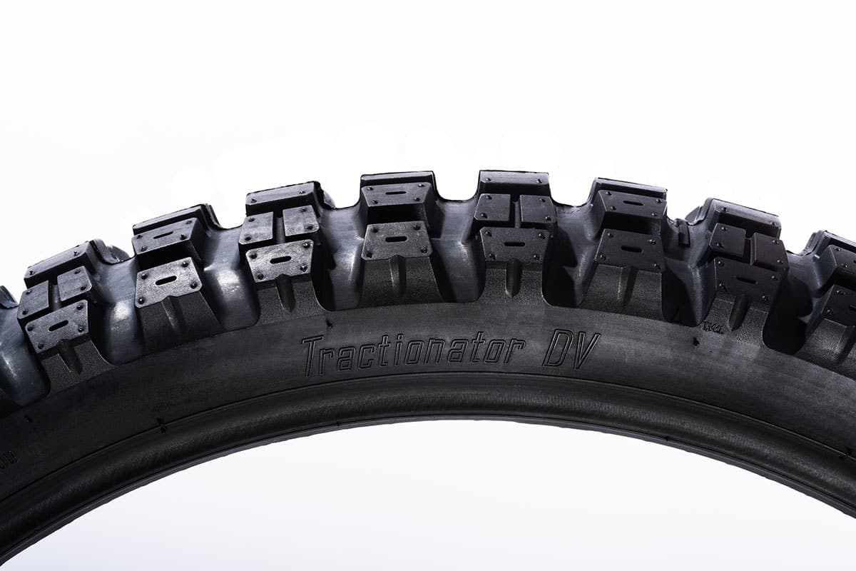 Motoz Tractionator DualVenture: side-on view of the tread arc with the model name moulded in the sidewall