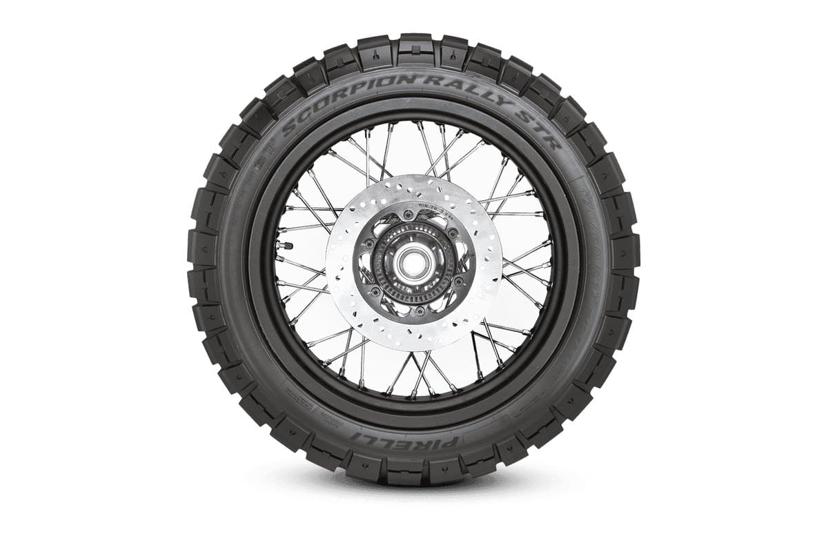Pirelli Scorpion Rally STR: one wheel flat side-on as a full circle, with the model and brand sidewall lettering legible