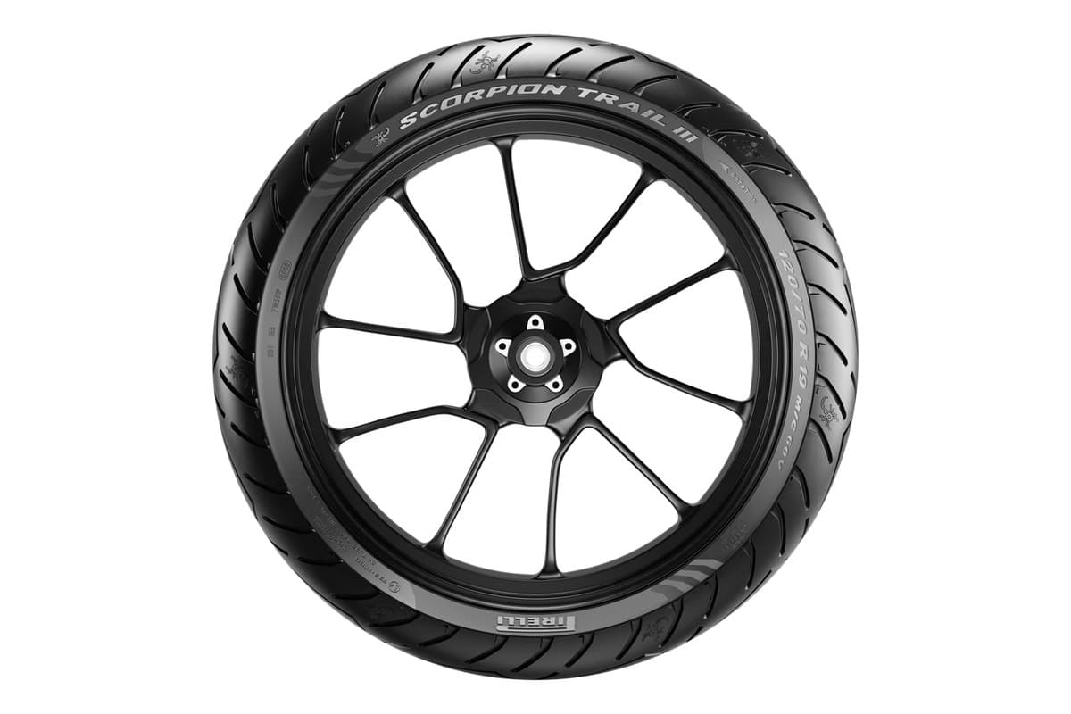 Pirelli Scorpion Trail III: one wheel flat side-on as a full circle, with the model sidewall lettering across the top