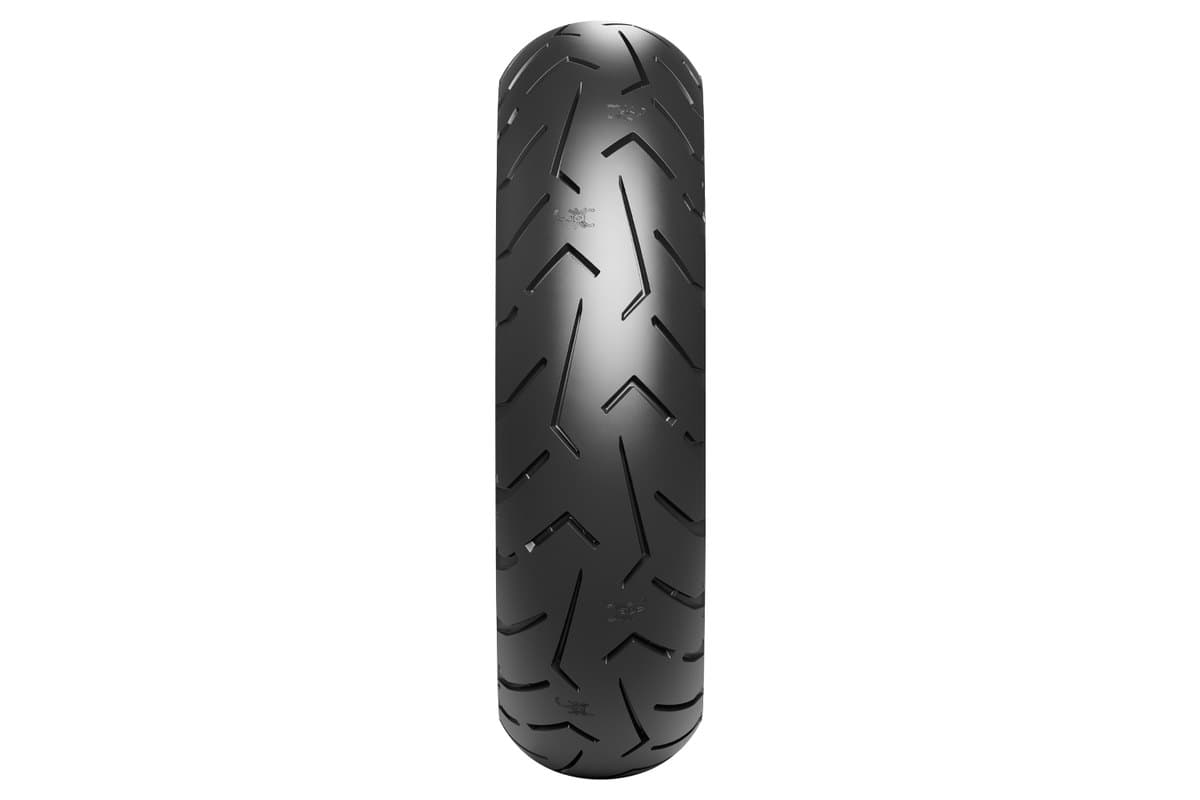 Pirelli Scorpion Trail III: a single tire head-on, showing the street-oriented arrow groove crown