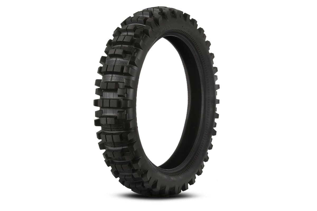 Kenda K760 Trakmaster: rear tire, upright three-quarter studio shot on white, wide carcass with tall widely spaced knobs