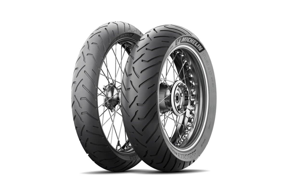 Michelin Anakee Road: front and rear pair on silver spoked wheels, leaning together at a three-quarter angle, on white