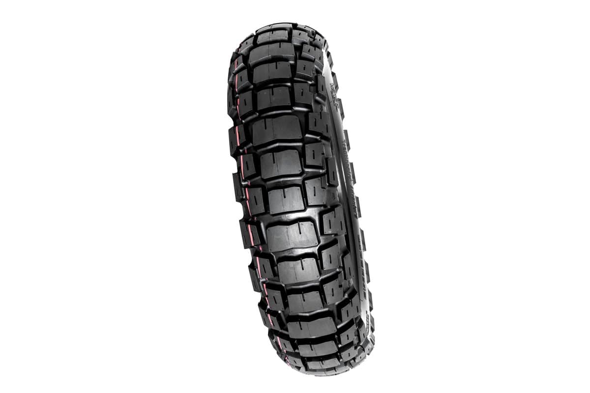Motoz Tractionator Adventure: the rear tire standing nearly upright and turned slightly, large square blocks, on white. A single shot is correct, this model is rear only