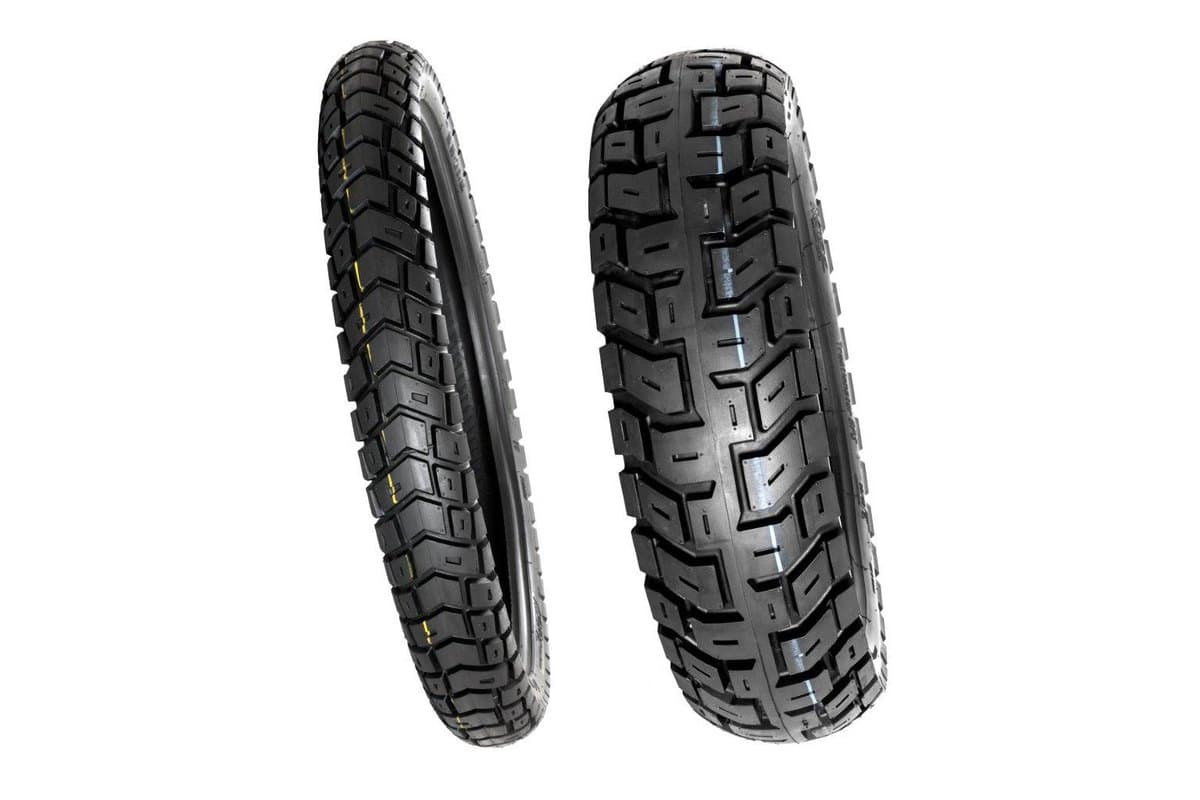 Motoz Tractionator GPS: front tire side on at left and rear angled toward the camera at right, on white