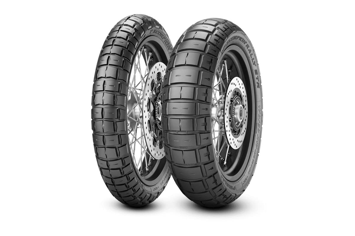 Pirelli Scorpion Rally STR: front and rear pair side by side on spoked wheels with brake discs, on white