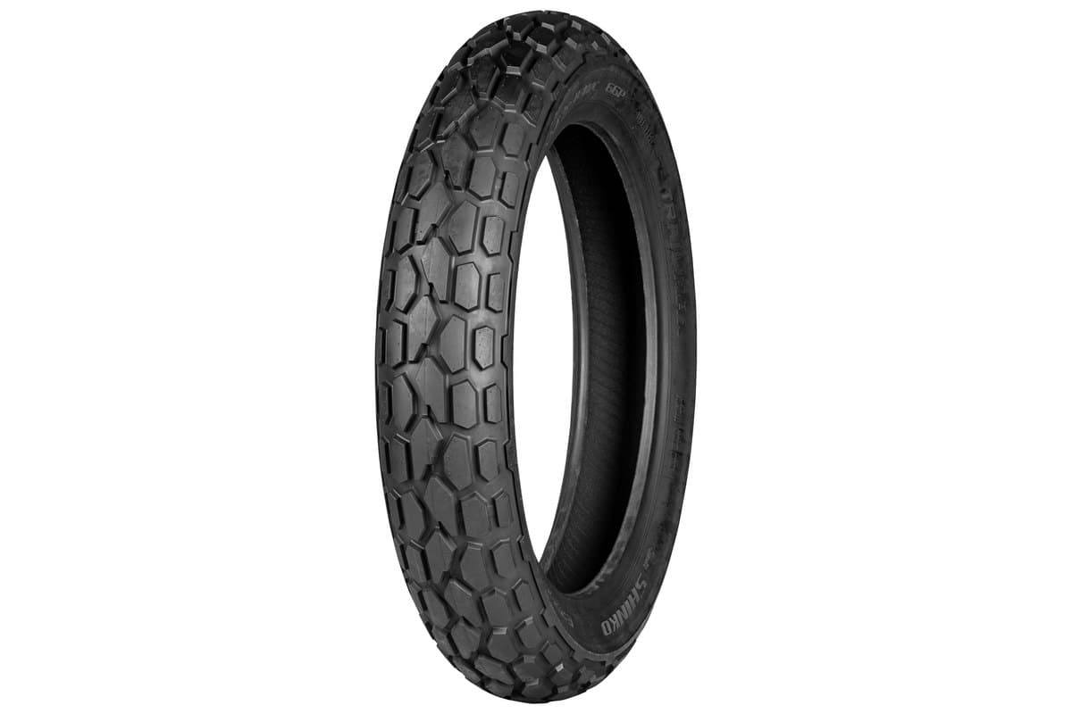 Shinko E200 Series: front tire, three-quarter studio view on white, narrow carcass with a shallow hexagonal-plate tread
