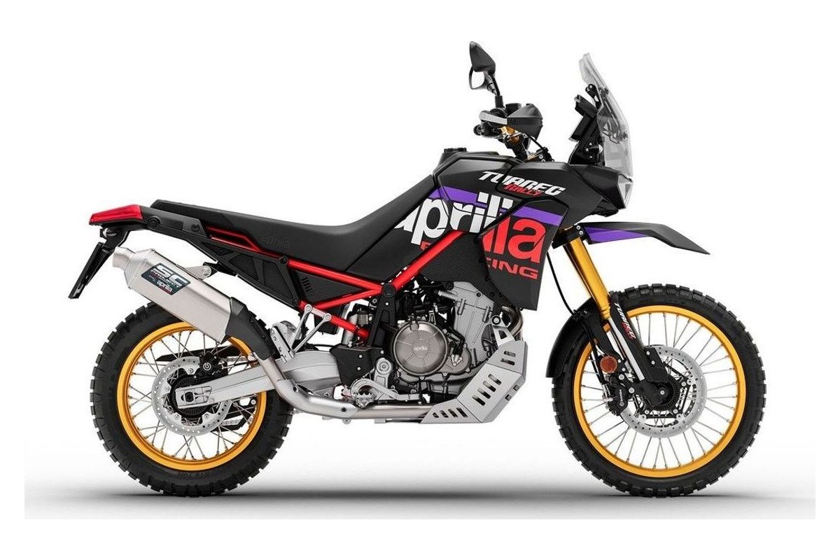 2027 Aprilia Tuareg 660 Rally in black with purple and red Aprilia Racing graphics, left-side studio profile showing gold-anodized spoked wheels and tall windscreen
