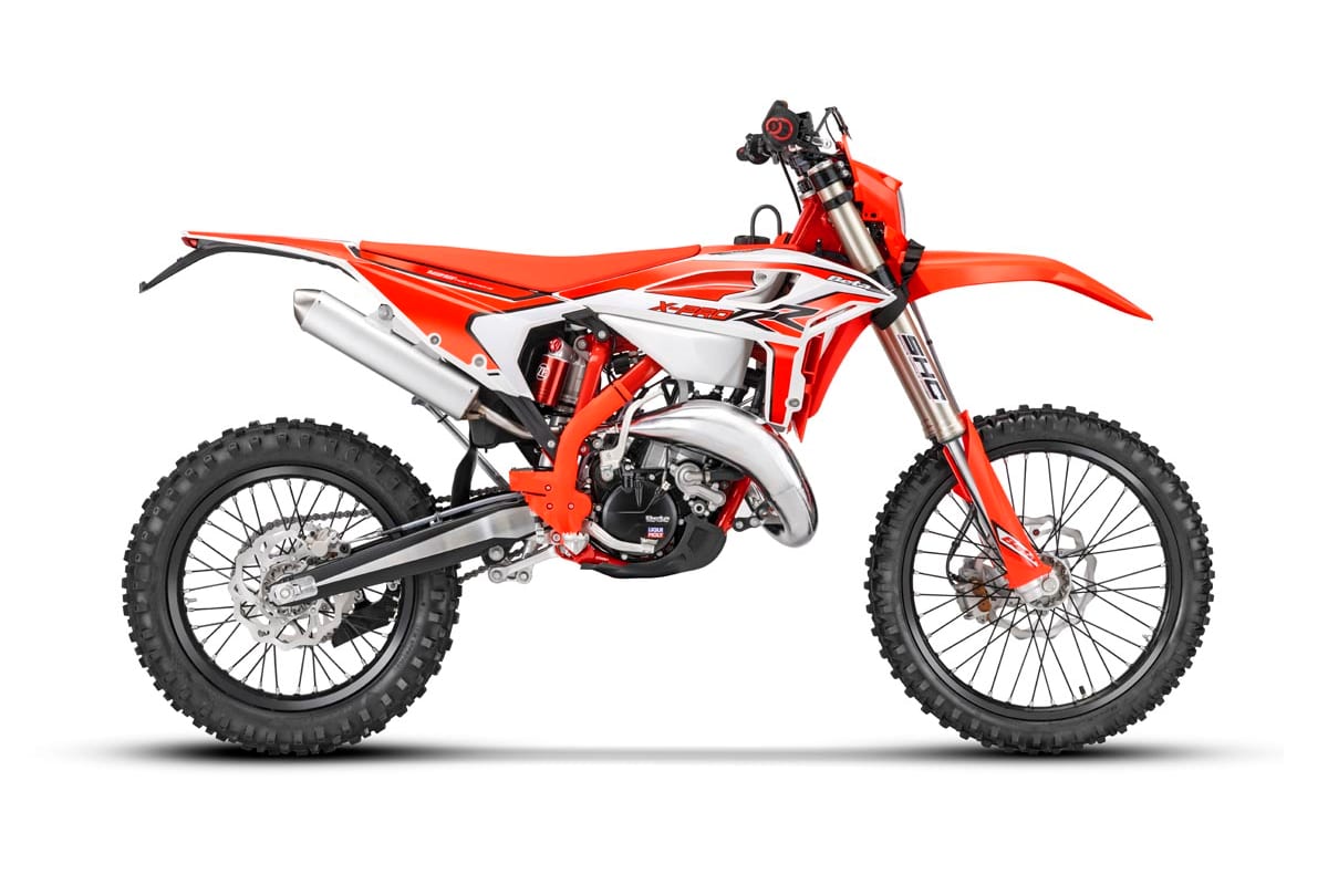 2027 Beta 125 RR X-Pro dirt bike in orange and white, right-side studio profile showing the gold Sachs fork and spoked wheels