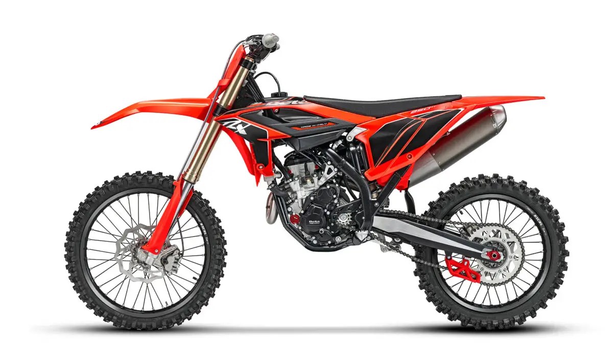 2027 Beta 250 RXF motocross bike in red and black, right-side studio profile showing the gold forks, red frame and titanium-look exhaust canister