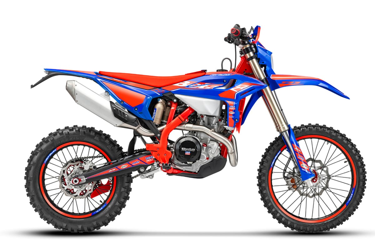 2026 Beta 430 RR Race enduro in red and blue Racing livery, right-side studio profile showing red frame, spoked wheels and aluminum silencer