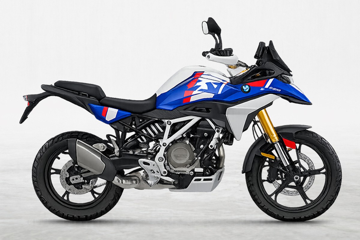 2027 BMW F 450 GS adventure bike in white and blue M livery, right-side studio profile on a white background showing gold forks and spoked wheels