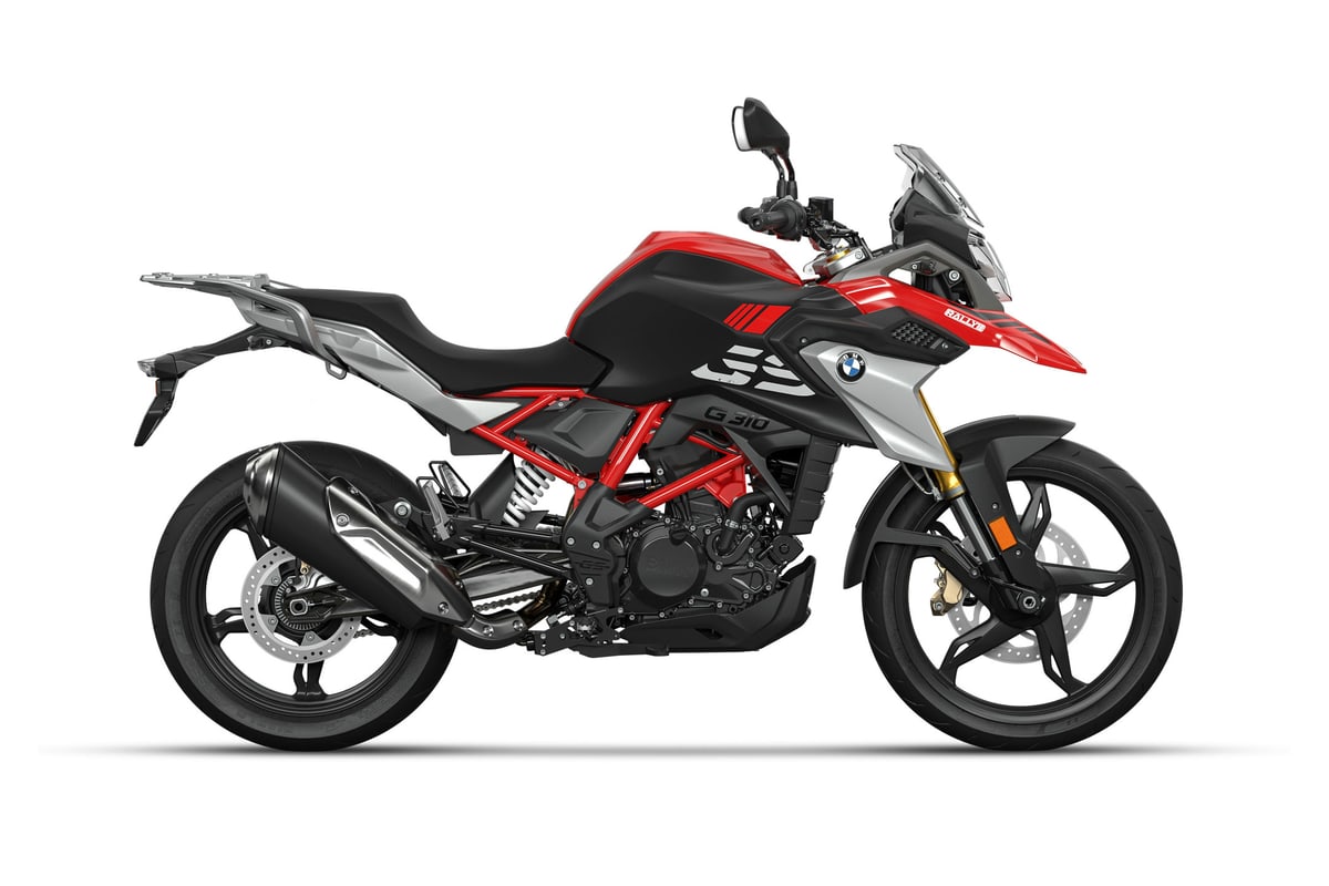 2025 BMW G 310 GS in red, white and black, right-side studio profile on white showing the 41mm inverted fork, red trellis frame and cast wheels