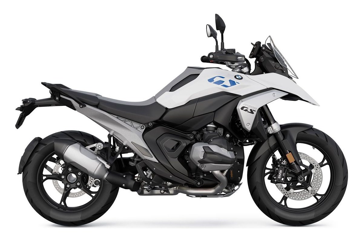 2027 BMW R 1300 GS adventure motorcycle in Racing Blue with white and red graphics, right-side studio profile showing spoked wheels and boxer engine cylinder