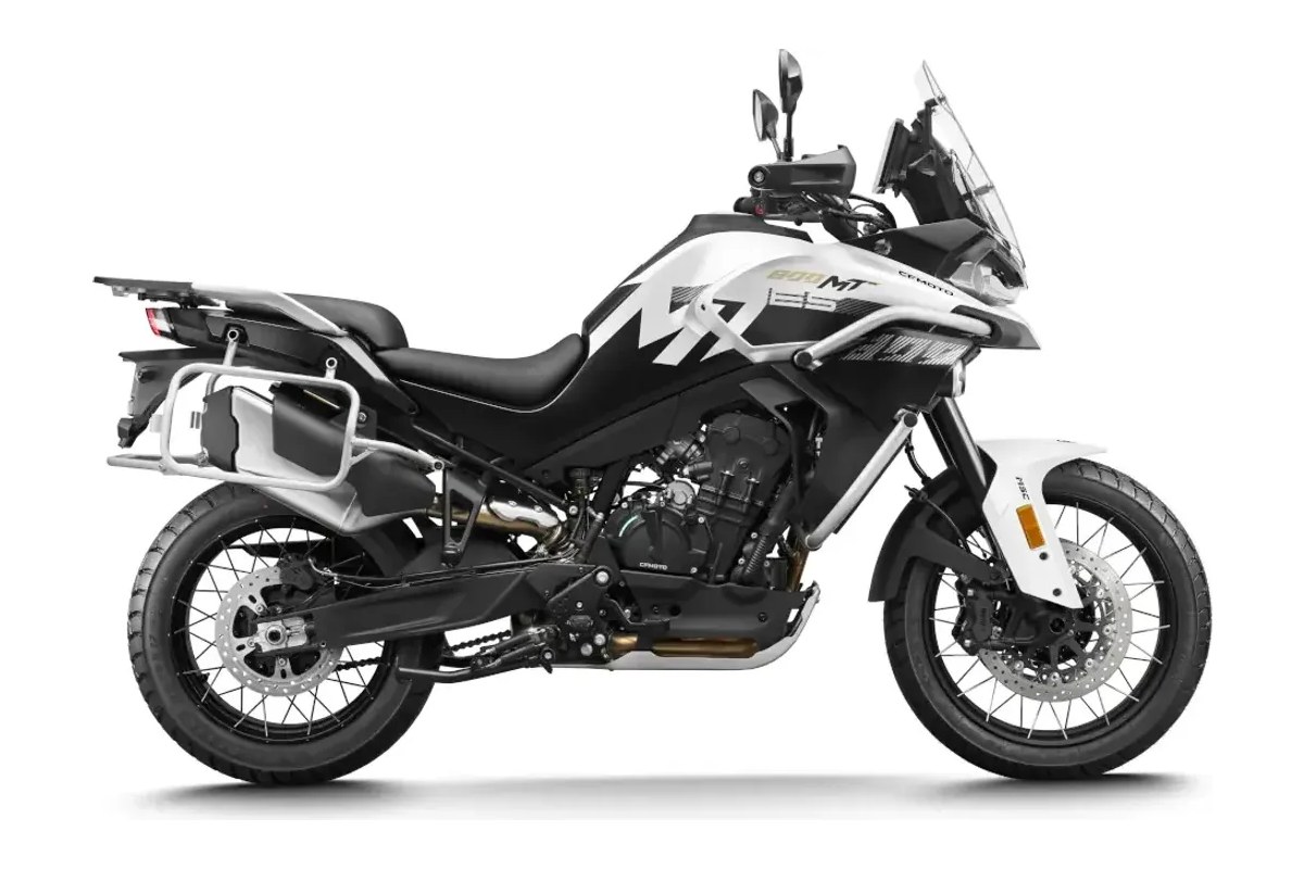 2026 CFMoto Ibex 800 E adventure motorcycle in white and blue swirl graphics, left-side studio profile showing gold spoked wheels and aluminum side cases