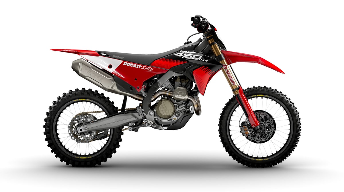 2026 Ducati Desmo450 MX Factory motocross bike in red and black, right-side studio profile showing gold Showa forks and Akrapovic exhaust