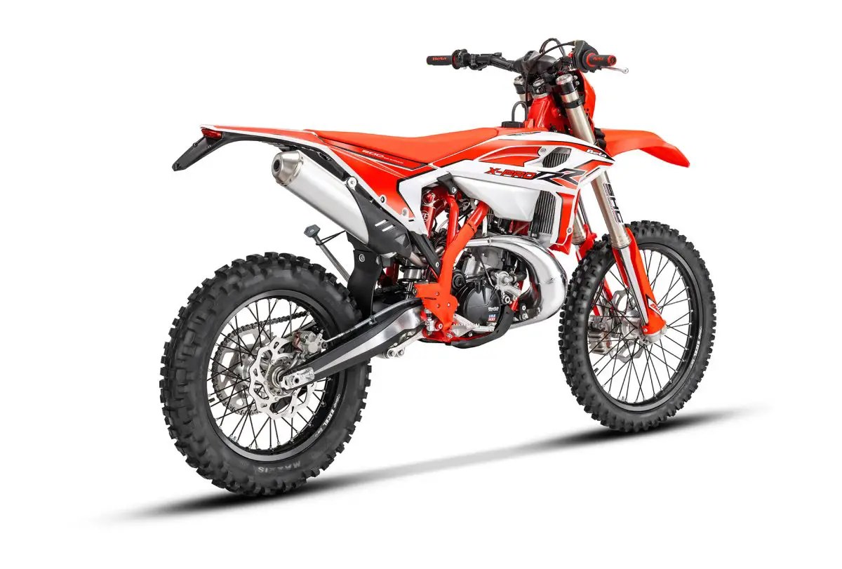 Beta 125 RR X-Pro rear three-quarter studio view highlighting the exhaust silencer, swingarm and X-PRO graphics on the tail