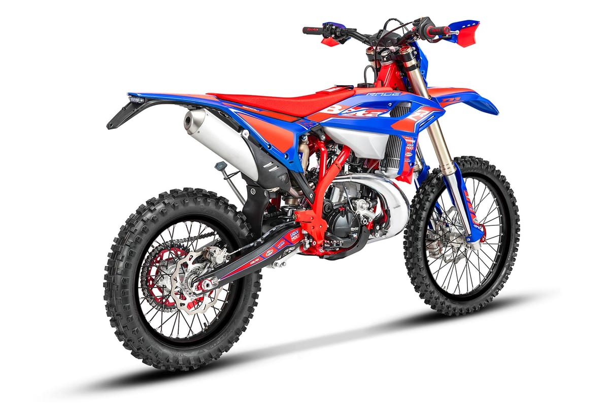 Beta 200 RR Race rear three-quarter studio view highlighting the exhaust silencer, red swingarm and knobby rear tire