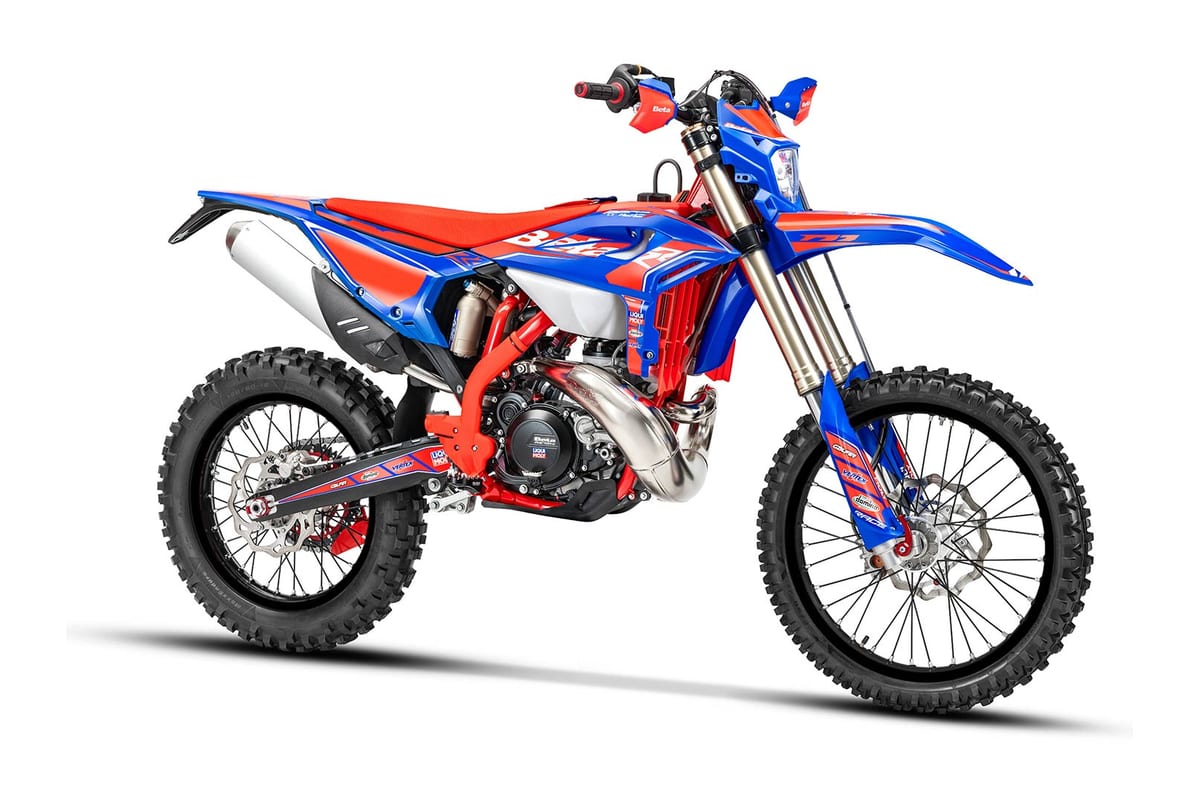 Beta 200 RR Race left-side studio profile with red seat, blue radiator shrouds and chrome exhaust header snaking down the frame