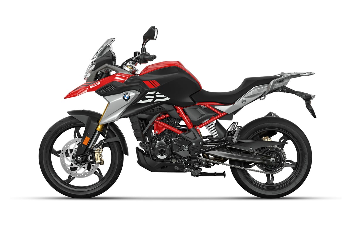 BMW G 310 GS left-side studio profile showing the chain, rear monoshock and upswept silencer