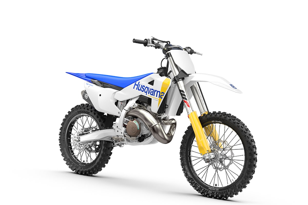 Husqvarna TC 300 right-front studio view showing the front number plate, fork guards and front disc