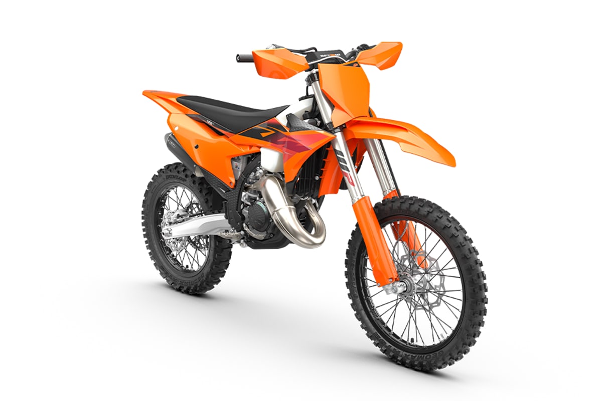 KTM 125 XC right-front studio view showing the front number plate, fork guards and front disc
