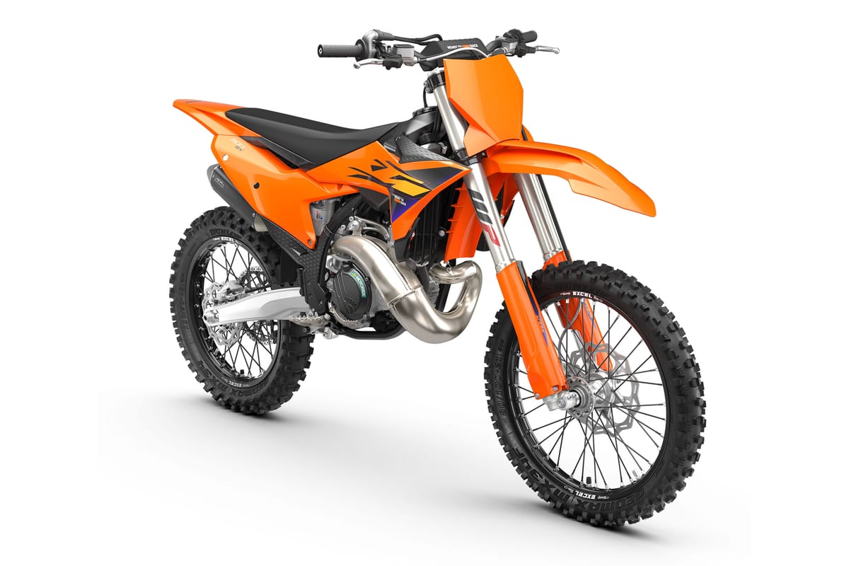 KTM 300 SX front three-quarter studio view highlighting the tapered handlebar, radiator shrouds and Excel spoked wheels with knobby tires